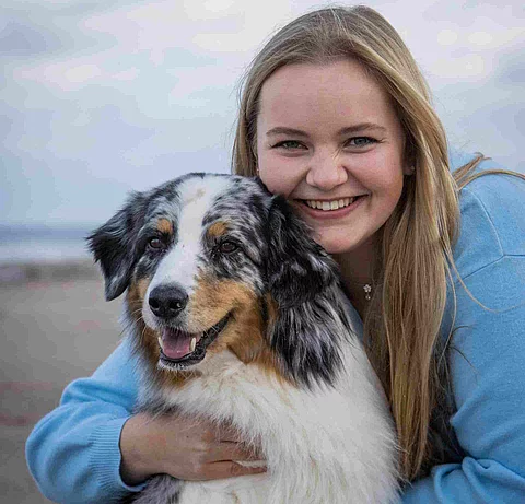 Merle Unger mit Hund