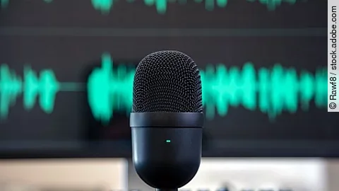 Black condenser microphone, blur turquoise waveform background.