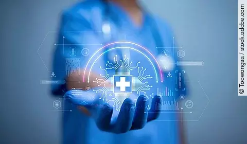 Auf einer ausgestreckten Hand ist ein Hologramm dargestellt. 