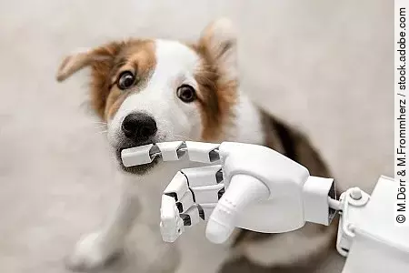 Roboter mit niedlichem Welpen