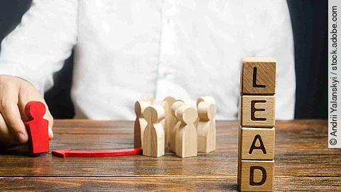 A businessman appoints a group of people a new leader. Appointme