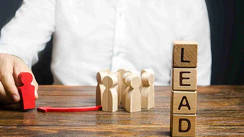 A businessman appoints a group of people a new leader. Appointme
