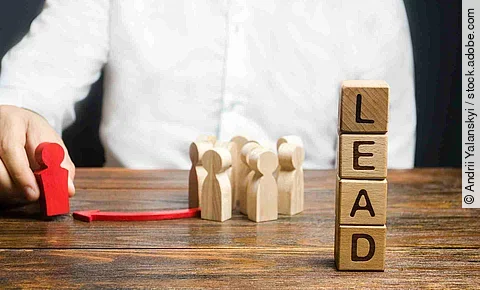 A businessman appoints a group of people a new leader. Appointme