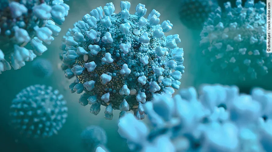 Einige Viren in blauer Farbe sind im Bild erkennbar.