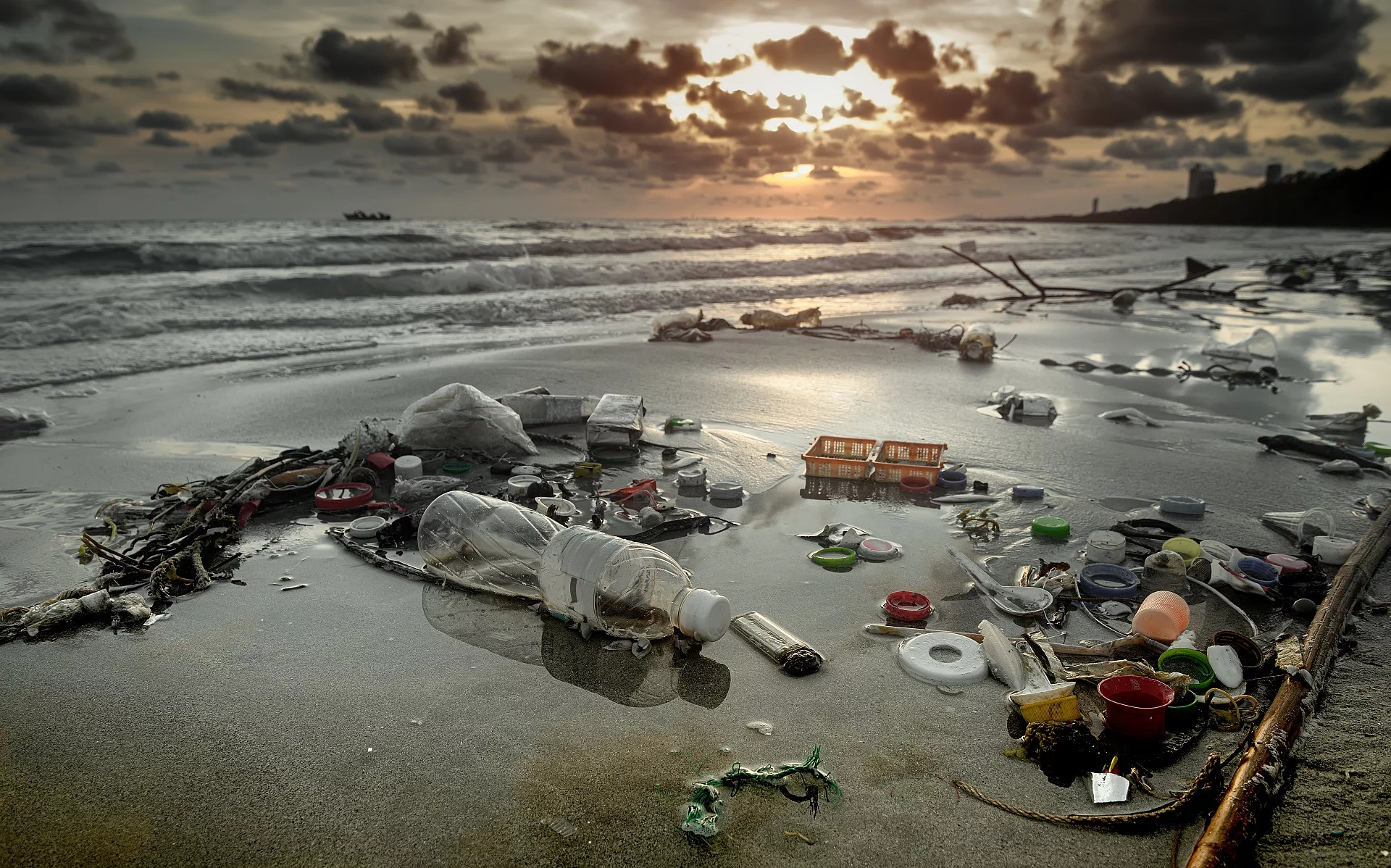 Dirty beach environment from plastic garbage.