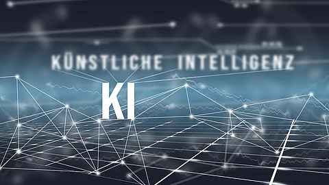 KI - KÜNSTLICHE INTELLIGENZ Auf blauem Hintergrund mit Vernetzungen steht "KÜNSTLICHE INTELLIGENZ" geschrieben.
