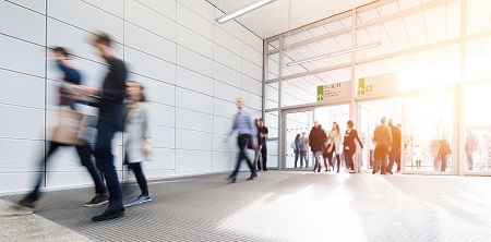 blurred people in a corridor