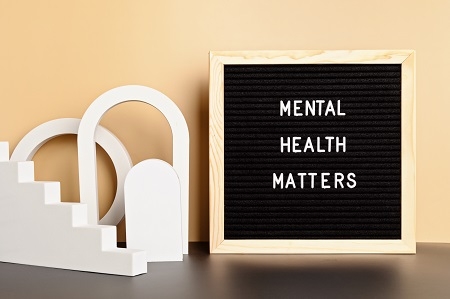 Mental health matters motivational quote on the letter board. In